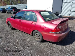 2005 Mitsubishi Lancer ES with VIN JA3AJ26E55U031209, listed as a IAAI auction lot 41541470 with 290,334 mi miles. Bid and sale history available at carsss.com. Image 3.