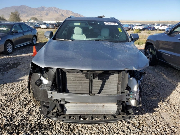 2024 Cadillac XT4 AWD Sport with VIN 1GYFZFR49RF134390, listed as a Copart auction lot 73012834 with 6,092 mi miles and Salvage title. Bid and sale history available at DreamBid. Image 5.