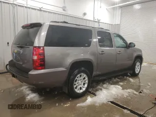 2013 Chevrolet Suburban LT with VIN 1GNSKJE72DR236026, listed as a Copart auction lot 86153104 with 222,417 mi miles and Salvage title. Bid and sale history available at DreamBid. Image 3.