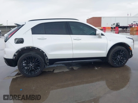 2024 Cadillac XT4 FWD Sport with VIN 1GYFZER42RF246488, listed as a IAAI auction lot 42029551 with 6,476 mi miles and . Bid and sale history available at DreamBid. Image 14.
