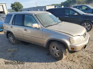 2000 Honda CR-V SE with VIN JHLRD1871YC038420, listed as a Copart auction lot 69101704 with 196,581 mi miles and Salvage Title. Bid and sale history available at carsss.com. Image 4.