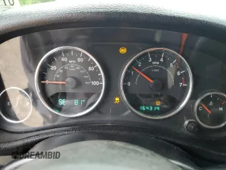 2013 Jeep Wrangler Sport with VIN 1C4AJWAG6DL576549, listed as a Copart auction lot 59888965 with 164,314 mi miles and Salvage title. Bid and sale history available at DreamBid. Image 9.