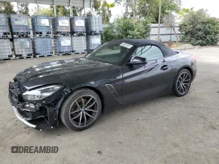 2022 BMW Z4 sDrive30i with VIN WBAHF3C08NWX72648, listed as a Copart auction lot 52153454 with 27,084 mi miles. Bid and sale history available at carsss.com. Image 1.