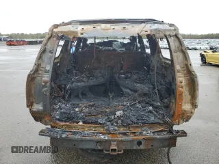 2018 Chevrolet Suburban LT z VIN 1GNSKHKC9JR262273, wystawiony jako Copart lot #51970175 z przebiegiem Nie podano mil oraz Szkoda całkowita • Salvage title. Historia ofert i sprzedaży dostępna na DreamBid. Obrazek 6.