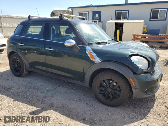 2014 MINI Countryman with VIN WMWZB3C51EWR40111, listed as a Copart auction lot 50274045 with 138,073 mi miles and Salvage title. Bid and sale history available at DreamBid. Image 4.