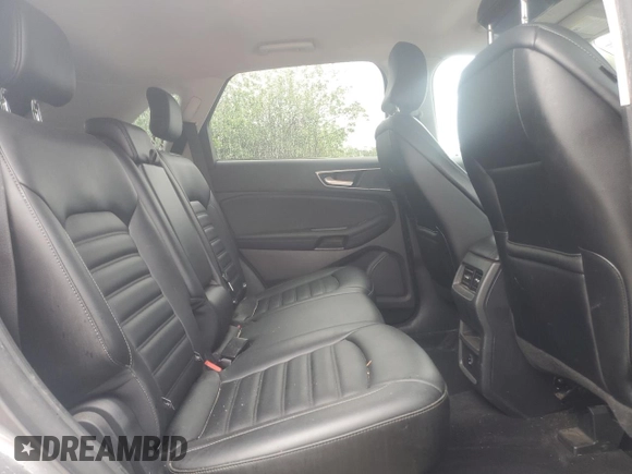 2021 Ford Edge SEL z VIN 2FMPK3J98MBA50555, wystawiony jako Copart lot #58509445 z przebiegiem 114 188 mil mil oraz Czysty tytuł • Clean title. Historia ofert i sprzedaży dostępna na DreamBid. Obrazek 11.