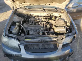 2000 Nissan Sentra XE with VIN 3N1CB51D3YL316712, listed as a Copart auction lot 84512254 with 228,070 mi miles and Salvage title. Bid and sale history available at DreamBid. Image 11.