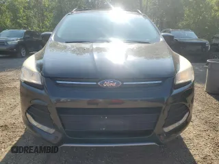 2013 Ford Escape SE z VIN 1FMCU0G95DUC27801, wystawiony jako Copart lot #63676255 z przebiegiem 175 587 mil mil oraz Czysty tytuł • Clean title. Historia ofert i sprzedaży dostępna na DreamBid. Obrazek 5.