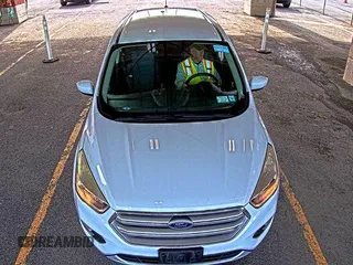 2017 Ford Escape SE z VIN 1FMCU9GD0HUD44281, wystawiony jako IAAI lot #42573170 z przebiegiem 99 085 mil mil oraz . Historia ofert i sprzedaży dostępna na DreamBid. Obrazek 12.