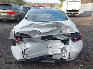 2020 Tesla Model 3 Long Range with VIN 5YJ3E1EB6LF618931, listed as a IAAI auction lot 41867451 with 47,502 mi miles and . Bid and sale history available at DreamBid. Image 16.
