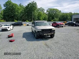 2004 Chevrolet Suburban LT z VIN 1GNEC16Z34J242670, wystawiony jako Copart lot #60987725 z przebiegiem 277 961 mil mil oraz Szkoda całkowita • Salvage title. Historia ofert i sprzedaży dostępna na DreamBid. Obrazek 15.