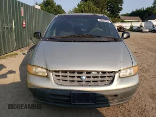 1999 Plymouth Voyager z VIN 2P4FP25B8XR325213, wystawiony jako Copart lot #68037484 z przebiegiem 121 807 mil mil oraz Nie do naprawy. Historia ofert i sprzedaży dostępna na DreamBid. Obrazek 5.