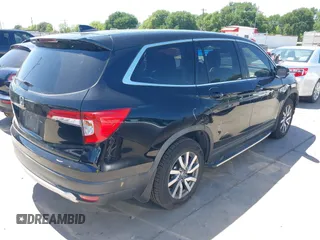 2019 Honda Pilot EX-L with VIN 5FNYF5H56KB042918, listed as a IAAI auction lot 42040516 with 113,433 mi miles and . Bid and sale history available at DreamBid. Image 4.