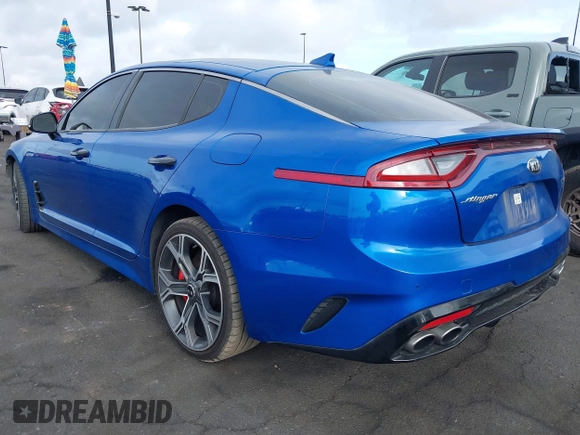 2018 Kia Stinger GT with VIN KNAE35LC5J6010230, listed as a IAAI auction lot 41924415 with 123,572 mi miles. Bid and sale history available at carsss.com. Image 3.