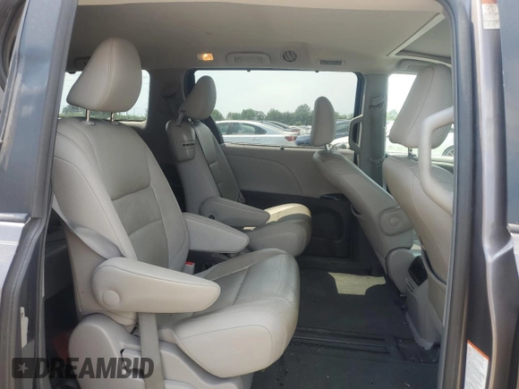 2015 Toyota Sienna XLE with VIN 5TDYK3DC6FS576670, listed as a Copart auction lot 62612345 with 106,475 mi miles and Salvage title. Bid and sale history available at DreamBid. Image 11.