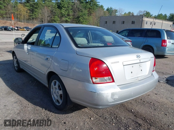 2003 Hyundai Elantra GLS z VIN KMHDN45D23U700908, wystawiony jako IAAI lot #42133529 z przebiegiem 100 955 mil mil oraz . Historia ofert i sprzedaży dostępna na DreamBid. Obrazek 3.