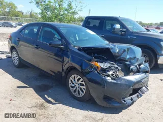 2019 Toyota Corolla L with VIN 2T1BURHE4KC188581, listed as a IAAI auction lot 41889744 with 50,673 mi miles. Bid and sale history available at carsss.com. Image 1.