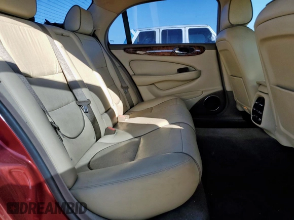2008 Jaguar XJ with VIN SAJWA79B58SH20211, listed as a Copart auction lot 46951055 with 144,655 mi miles and Salvage Title. Bid and sale history available at carsss.com. Image 10.