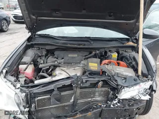 2014 Toyota Camry Hybrid LE with VIN 4T1BD1FK6EU112308, listed as a IAAI auction lot 41175963 with 116,557 mi miles. Bid and sale history available at carsss.com. Image 10.