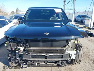 2025 Rivian R1S Adventure with VIN 7PDSGBBA4SN047584, listed as a IAAI auction lot 41372645 with 501 mi miles. Bid and sale history available at carsss.com. Image 13.
