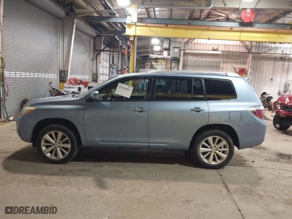2009 Toyota Highlander Hybrid Limited with VIN JTEEW44A592026718, listed as a IAAI auction lot 41641805 with 247,656 mi miles. Bid and sale history available at carsss.com. Image 14.