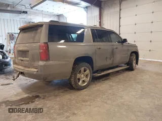 2019 Chevrolet Suburban Premier with VIN 1GNSKJKC1KR291629, listed as a IAAI auction lot 41565675 with 129,672 mi miles and . Bid and sale history available at DreamBid. Image 4.