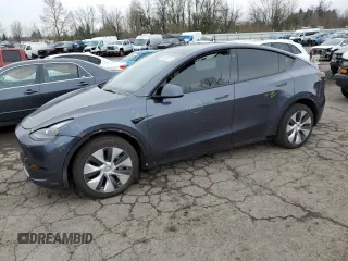 2023 Tesla Model Y Long Range z VIN 7SAYGDEE9PF619740, wystawiony jako Copart lot #48235175 z przebiegiem 28 442 mil mil oraz Szkoda całkowita • Salvage title. Historia ofert i sprzedaży dostępna na DreamBid. Obrazek 1.