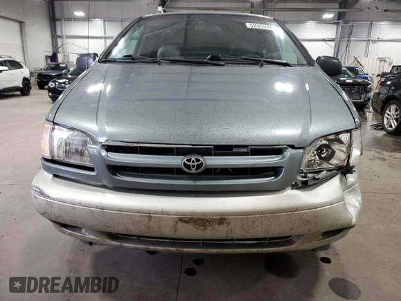 2000 Toyota Sienna LE z VIN 4T3ZF13C7YU284445, wystawiony jako Copart lot #52452465 z przebiegiem 150 609 mil mil oraz Szkoda całkowita • Salvage title. Historia ofert i sprzedaży dostępna na DreamBid. Obrazek 5.
