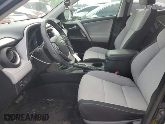 2018 Toyota RAV4 XLE with VIN 2T3WFREV3JW469307, listed as a Copart auction lot 57092295 with 47,639 mi miles and Salvage title. Bid and sale history available at DreamBid. Image 7.