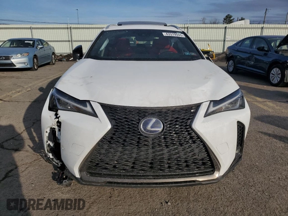 2021 Lexus UX with VIN JTHR9JBH2M2049747, listed as a Copart auction lot 43319555 with 22,606 mi miles and Salvage Title. Bid and sale history available at carsss.com. Image 5.