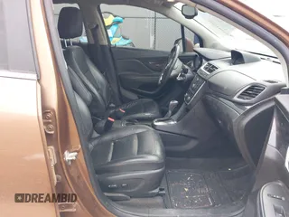 2016 Buick Encore Leather with VIN KL4CJCSB6GB553593, listed as a IAAI auction lot 41582660 with 95,713 mi miles and . Bid and sale history available at carsss.com. Image 5.