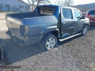 2013 Honda Ridgeline RTL with VIN 5FPYK1F55DB004842, listed as a IAAI auction lot 41843327 with 178,997 mi miles. Bid and sale history available at carsss.com. Image 4.