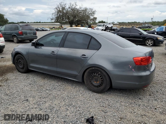 2014 Volkswagen Jetta S with VIN 3VW2K7AJ8EM231099, listed as a Copart auction lot 65752605 with 143,010 mi miles and Salvage title. Bid and sale history available at DreamBid. Image 2.