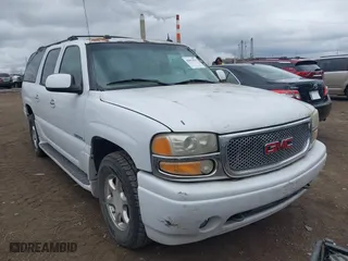 2004 GMC Yukon XL Denali with VIN 1GKFK66UX4J195109, listed as a IAAI auction lot 41852927 with 67,511 mi miles. Bid and sale history available at carsss.com. Image 1.