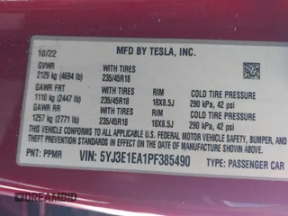 2023 Tesla Model 3 with VIN 5YJ3E1EA1PF385490, listed as a IAAI auction lot 42315884 with 17,590 mi miles and . Bid and sale history available at DreamBid. Image 9.