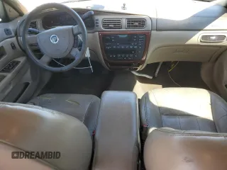 2004 Mercury Sable LS Premium z VIN 1MEFM55S34G611027, wystawiony jako Copart lot #50611585 z przebiegiem 224 081 mil mil oraz Tytuł czysty. Historia ofert i sprzedaży dostępna na DreamBid. Obrazek 8.