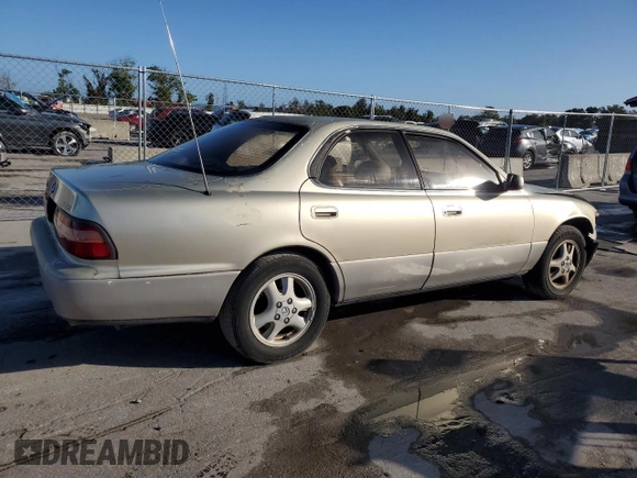 1995 Lexus ES 300 with VIN JT8GK13T6S0101694, listed as a Copart auction lot 77683754 with 247,984 mi miles and Salvage Title. Bid and sale history available at DreamBid. Image 3.