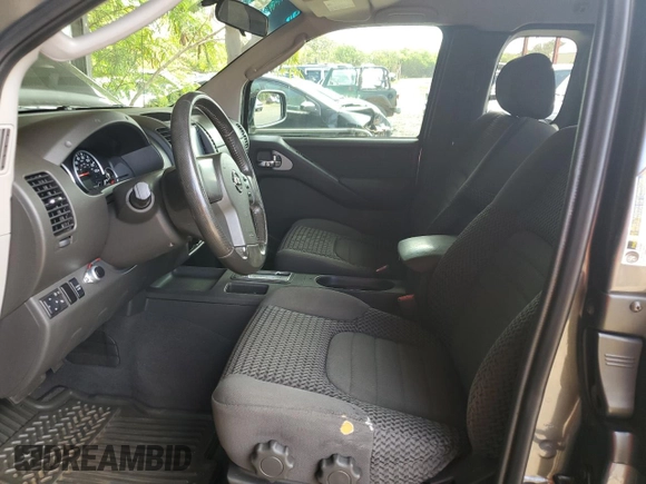 2007 Nissan Frontier Nismo with VIN 1N6AD06W57C439818, listed as a Copart auction lot 61210285 with 174,708 mi miles and Salvage title. Bid and sale history available at DreamBid. Image 7.