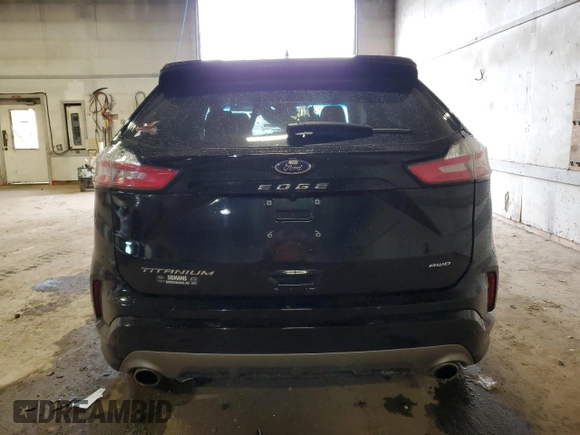 2021 Ford Edge Titanium z VIN 2FMPK4K90MBA39604, wystawiony jako Copart lot #55942265 z przebiegiem 28 117 mil mil oraz Nie do naprawy • Non repairable. Historia ofert i sprzedaży dostępna na DreamBid. Obrazek 6.
