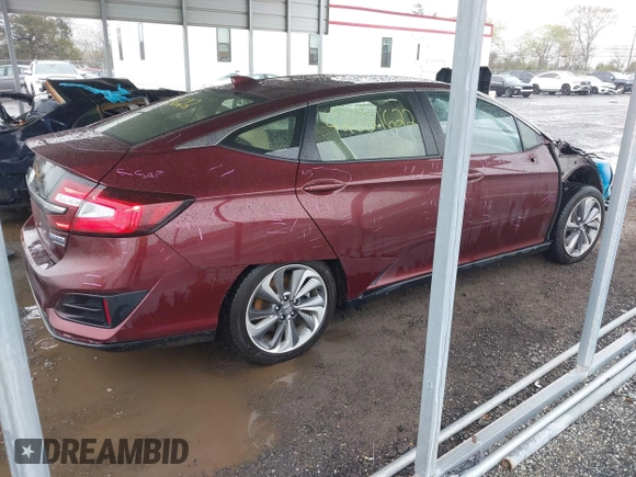 2018 Honda Clarity Plug-In Hybrid Touring with VIN JHMZC5F3XJC005797, listed as a IAAI auction lot 42021622 with 58,307 mi miles. Bid and sale history available at carsss.com. Image 4.