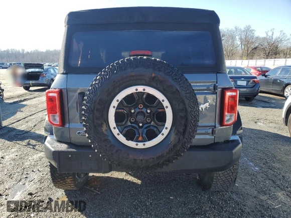 2021 Ford Bronco with VIN 1FMEE5DP9MLA89837, listed as a Copart auction lot 87672995 with 27,341 mi miles and Salvage Title. Bid and sale history available at DreamBid. Image 6.
