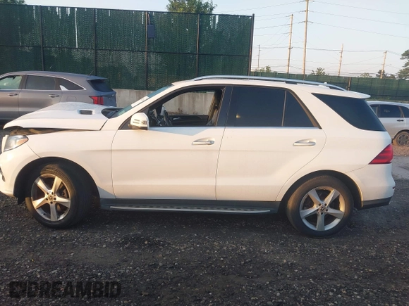 2018 Mercedes-Benz GLE 350 with VIN 4JGDA5HB3JB159999, listed as a IAAI auction lot 42642708 with 135,978 mi miles and . Bid and sale history available at DreamBid. Image 14.
