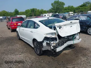 2018 Ford Fusion Titanium with VIN 3FA6P0D97JR247621, listed as a IAAI auction lot 42465608 with 174,983 mi miles and . Bid and sale history available at DreamBid. Image 3.