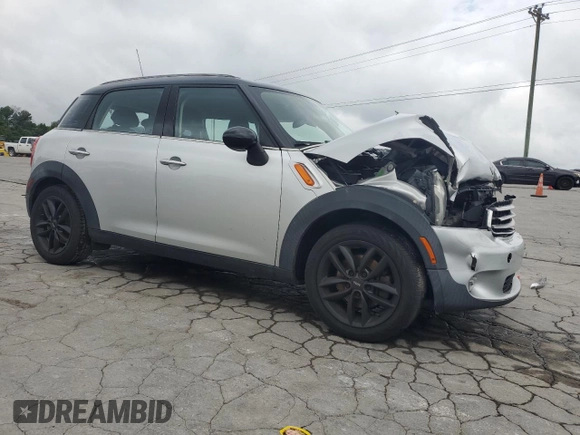 2012 MINI Countryman with VIN WMWZB3C5XCWM06778, listed as a Copart auction lot 61201285 with 64,676 mi miles and Salvage title. Bid and sale history available at DreamBid. Image 4.
