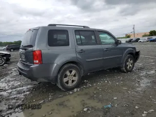 2011 Honda Pilot EX-L z VIN 5FNYF4H76BB095369, wystawiony jako Copart lot #57026435 z przebiegiem 128 443 mil mil oraz Szkoda całkowita • Salvage title. Historia ofert i sprzedaży dostępna na DreamBid. Obrazek 3.