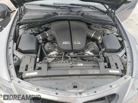 2007 BMW 6 Series M6 z VIN WBSEK93557CY78648, wystawiony jako Copart lot #52179345 z przebiegiem 22 453 mil mil oraz Szkoda całkowita • Salvage title. Historia ofert i sprzedaży dostępna na DreamBid. Obrazek 11.