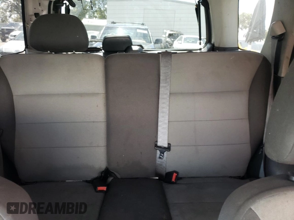 2007 Ford Escape XLS z VIN 1FMYU02Z97KC06172, wystawiony jako Copart lot #56978575 z przebiegiem 155 456 mil mil oraz Szkoda całkowita • Salvage title. Historia ofert i sprzedaży dostępna na DreamBid. Obrazek 10.