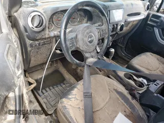 2015 Jeep Wrangler Unlimited Rubicon z VIN 1C4BJWFG0FL529310, wystawiony jako Copart lot #64337405 z przebiegiem Nie podano mil oraz Szkoda całkowita • Salvage title. Historia ofert i sprzedaży dostępna na DreamBid. Obrazek 8.