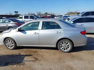 2009 Toyota Corolla with VIN JTDBL40E999021621, listed as a IAAI auction lot 41636462 with 123,650 mi miles. Bid and sale history available at carsss.com. Image 14.