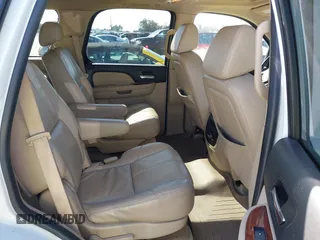 2007 Chevrolet Tahoe LTZ with VIN 1GNFC13027J402178, listed as a IAAI auction lot 41605898 with 203,677 mi miles and . Bid and sale history available at DreamBid. Image 8.